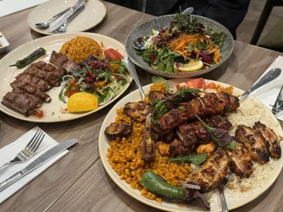 Platters of grilled meats with rice and salad at Antep in Oxford