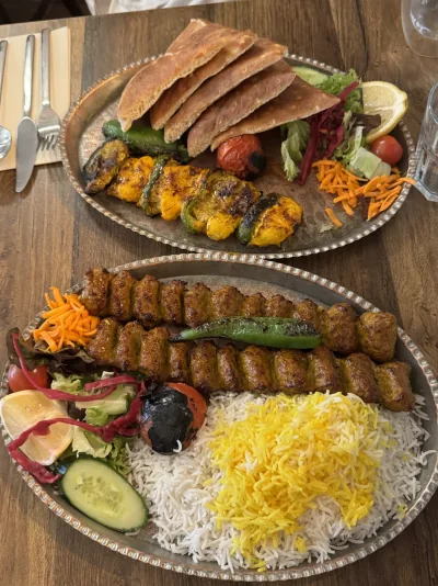 Grilled kebabs with rice, flatbread and salad at Shiraz in Oxford